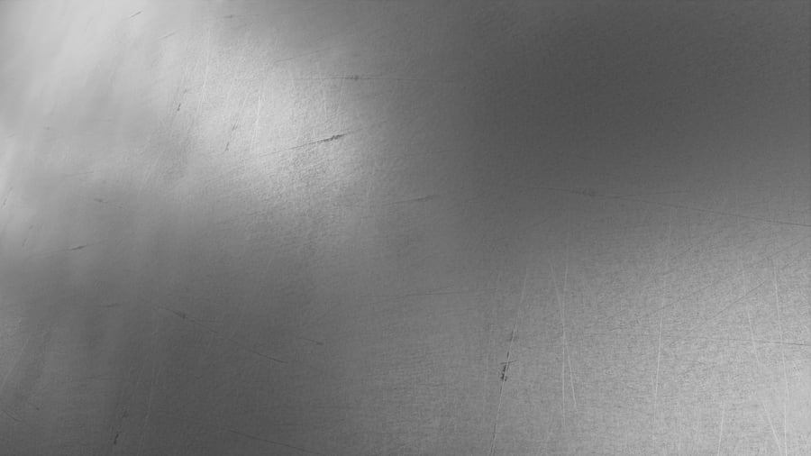 Ciemna, porysowana tekstura metalicznego aluminium