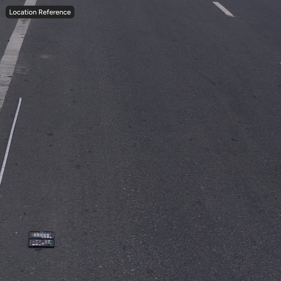 Hladký asfalt se strukturou starého kameniva, hnědý