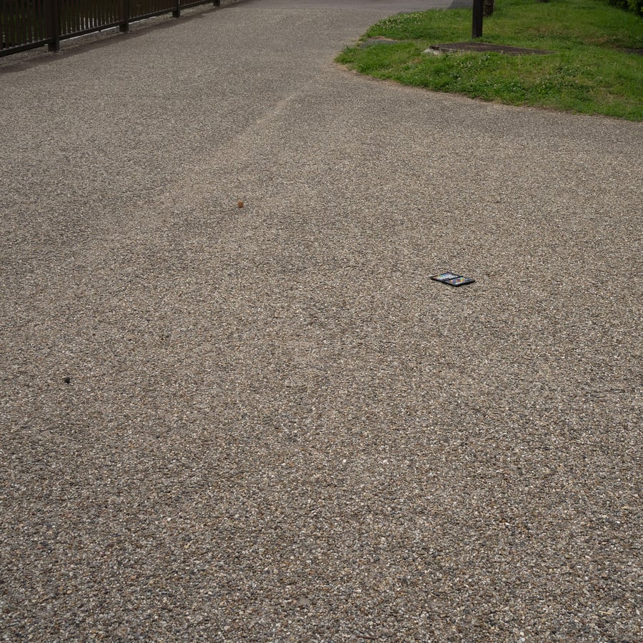 Pebbledash-Betongehweg-Textur