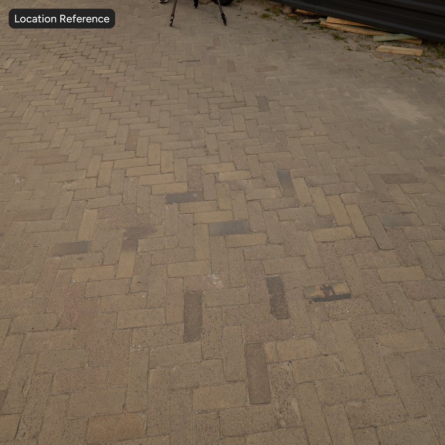 Texture de pavé à chevrons en brique usée, beige
