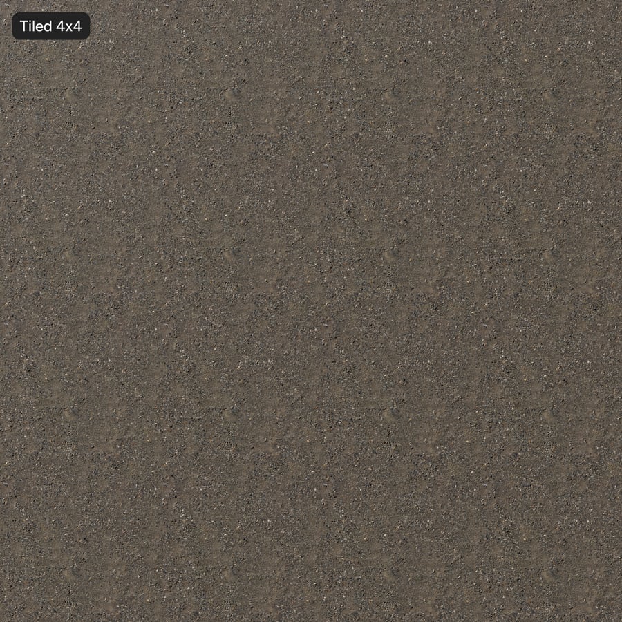Textura tmavého štěrku na hlíně