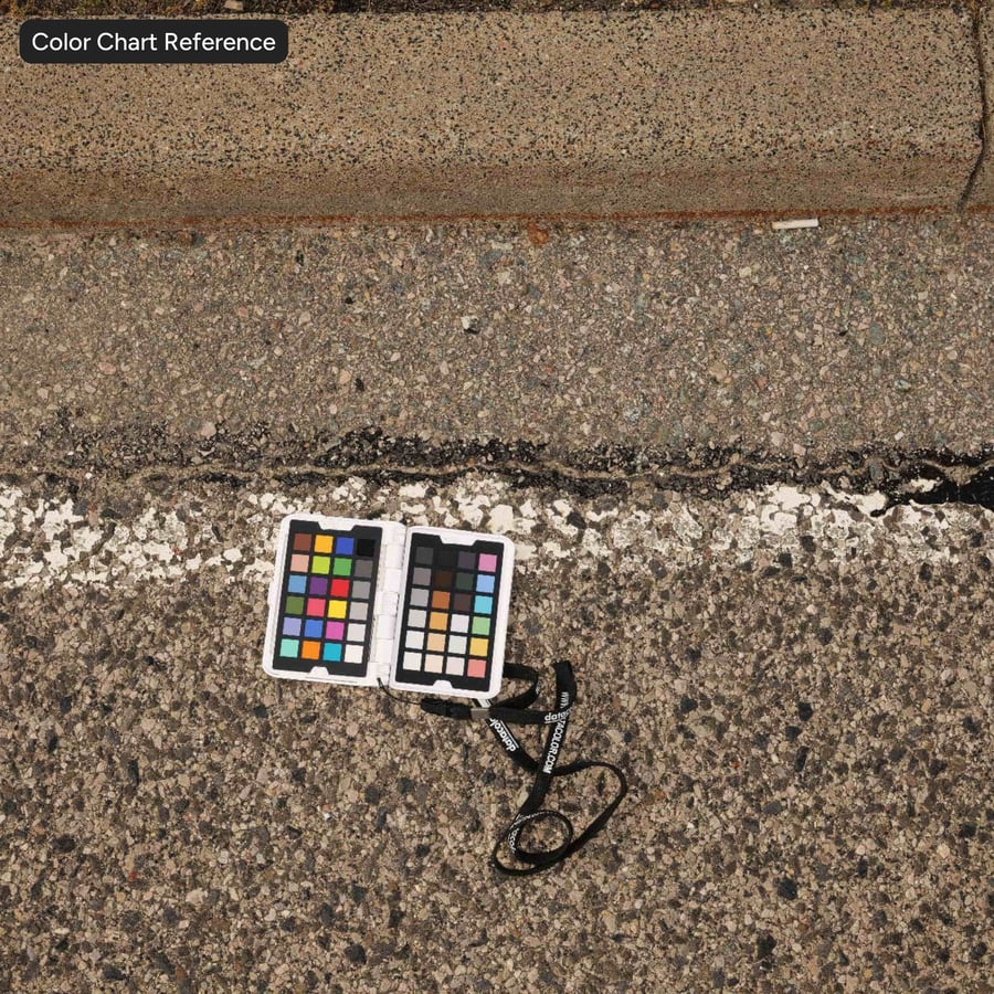 Blass gesprenkelte Asphaltstraßentextur